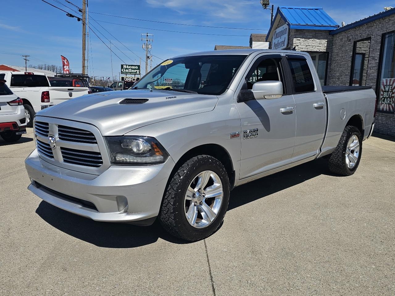 RAM 1500 4WD Quad Cab 140.5" Sport 2014