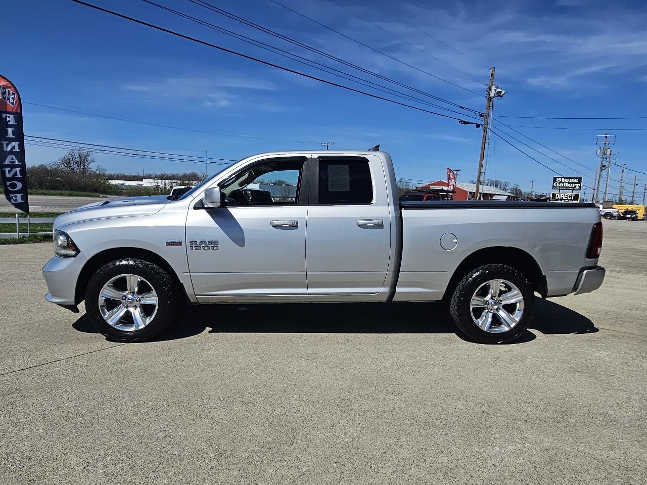 RAM 1500 4WD Quad Cab 140.5" Sport 2014
