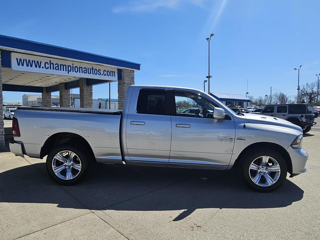 RAM 1500 4WD Quad Cab 140.5" Sport 2014