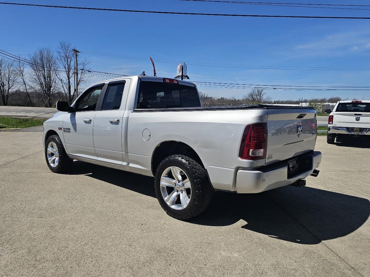 RAM 1500 4WD Quad Cab 140.5" Sport 2014