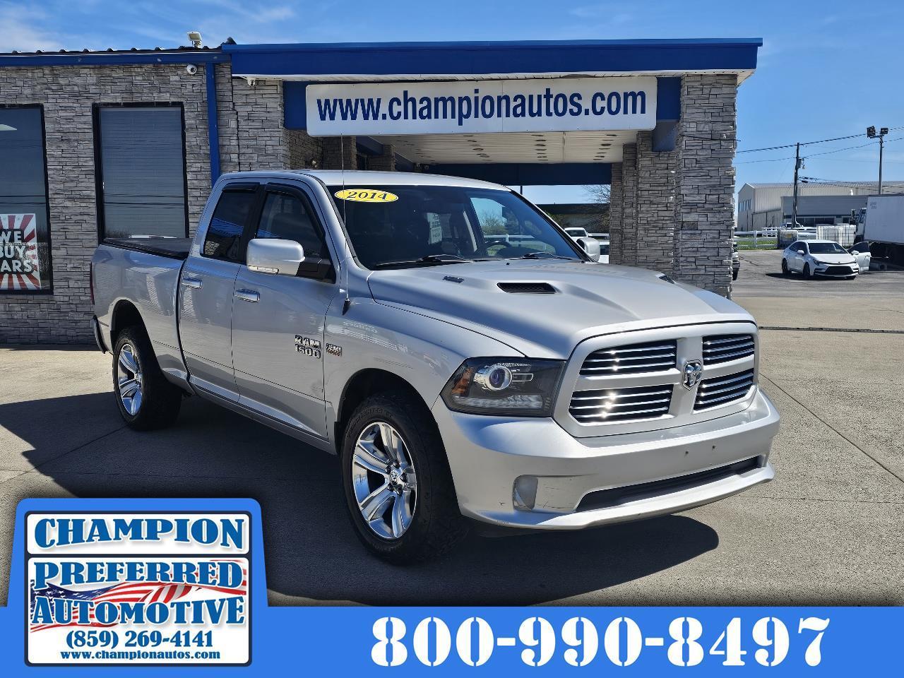 2014 RAM 1500 4WD Quad Cab 140.5" Sport