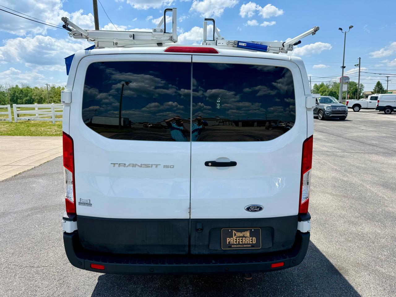 Ford Transit Cargo Van T-150 130" Low Rf 8670 GVWR RWD 2021