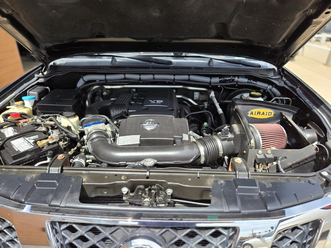 Nissan Frontier LE King Cab 4WD 2010
