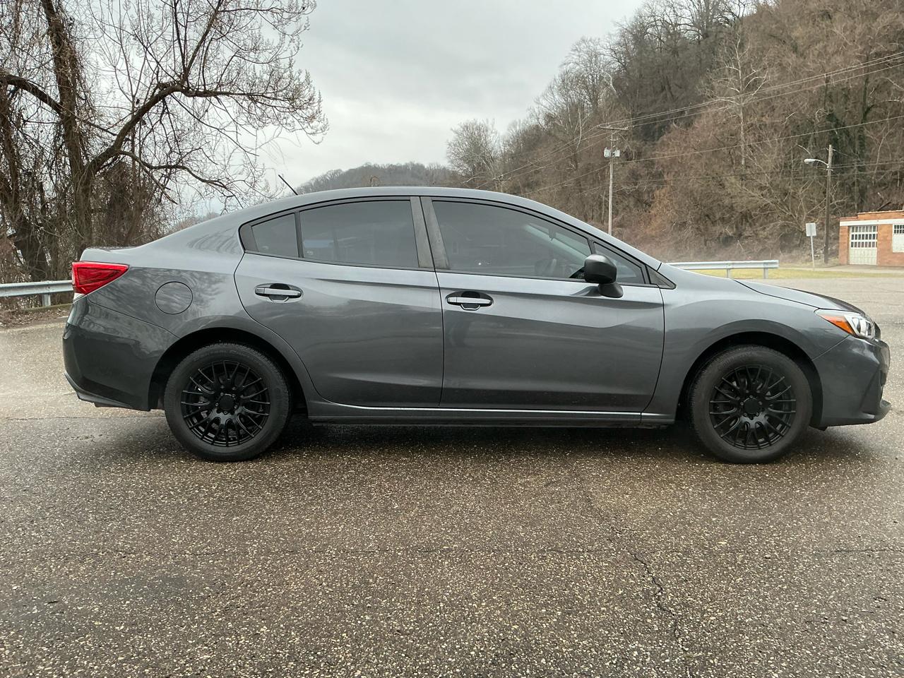 Subaru Impreza 2.0i 4-door CVT 2019