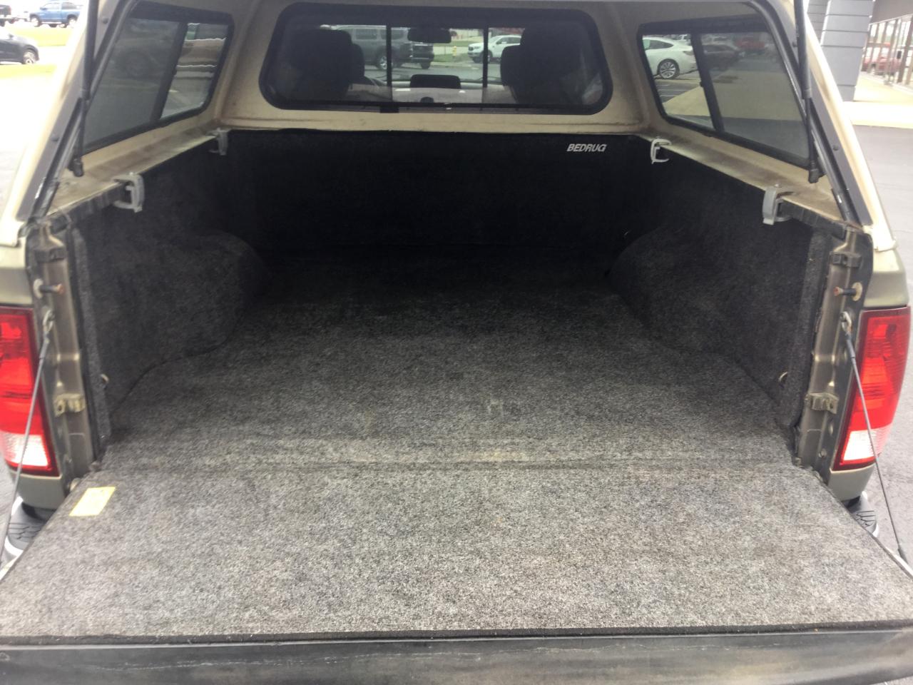 RAM 1500 2WD Quad Cab 140.5" SLT 2013