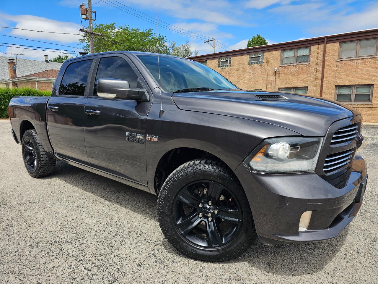 RAM 1500 4WD Crew Cab 140.5" Sport 2015
