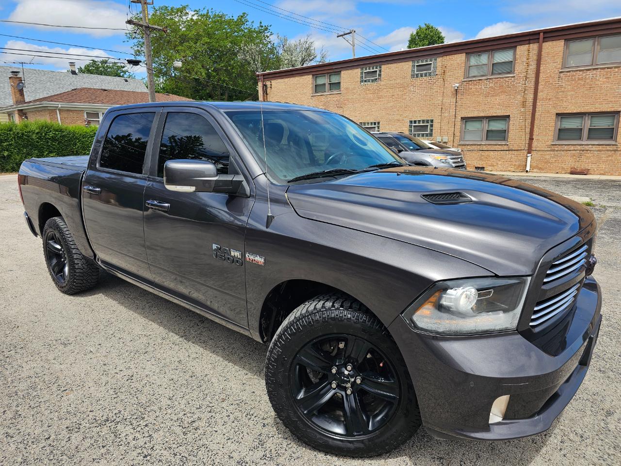RAM 1500 4WD Crew Cab 140.5" Sport 2015