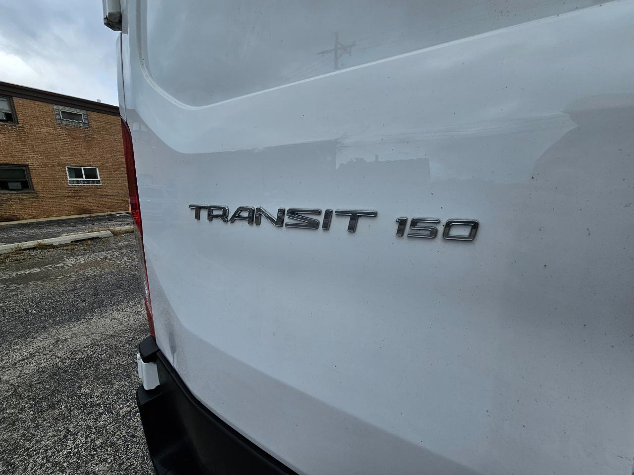 Ford Transit Cargo Van T-150 130" Low Rf 8670 GVWR RWD 2022