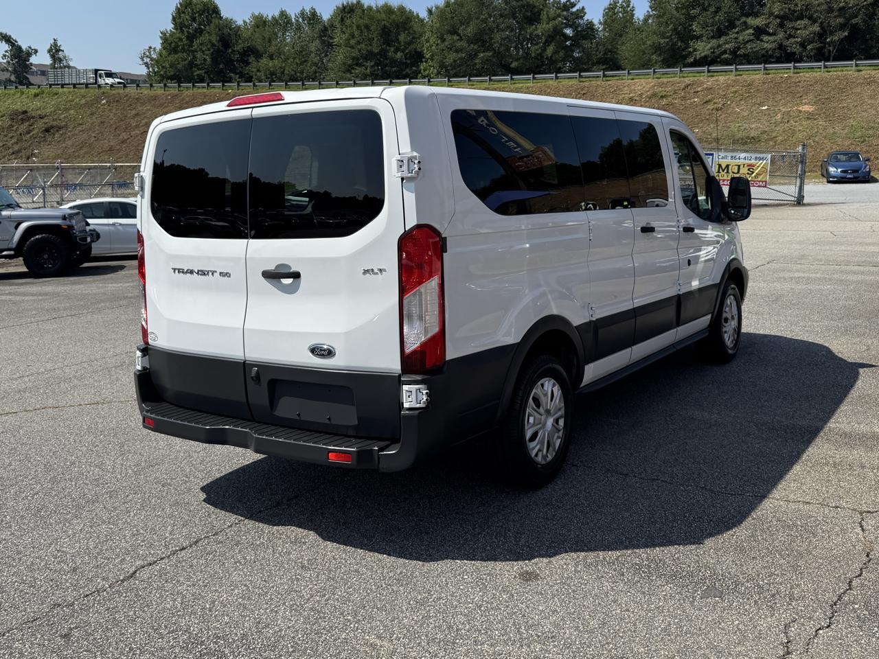 Ford Transit 150 Wagon Low Roof XLT 60/40 Pass. 130-in. WB 2015