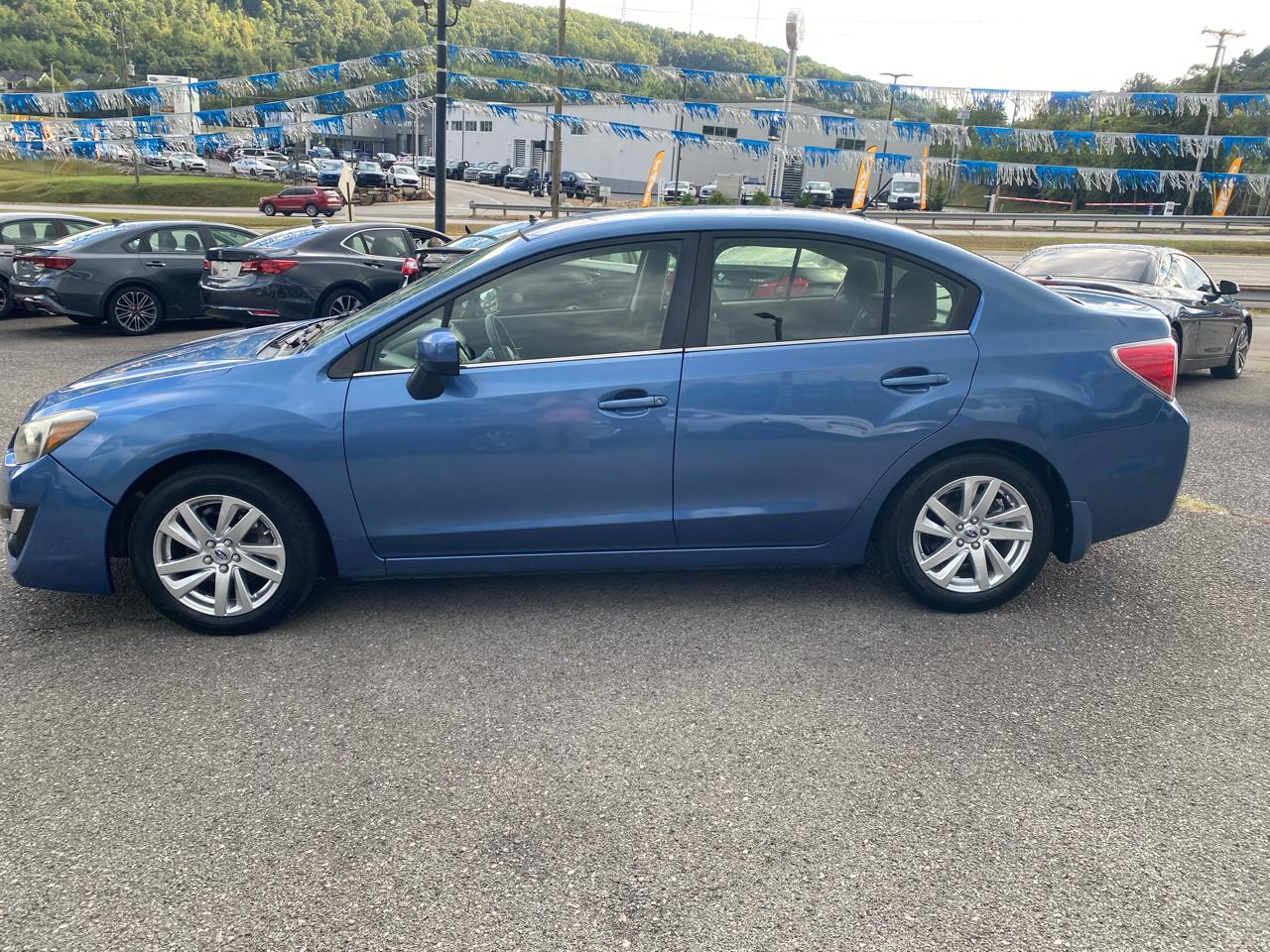 Subaru Impreza Sedan 4dr CVT 2.0i Premium 2015
