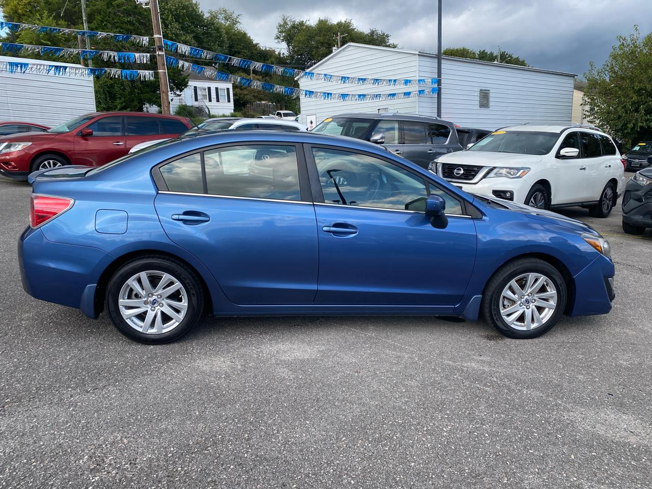 Subaru Impreza Sedan 4dr CVT 2.0i Premium 2015