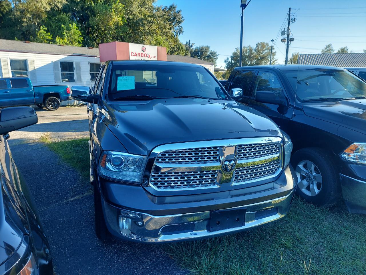 2014 RAM 1500 4WD Crew Cab 140.5" Laramie