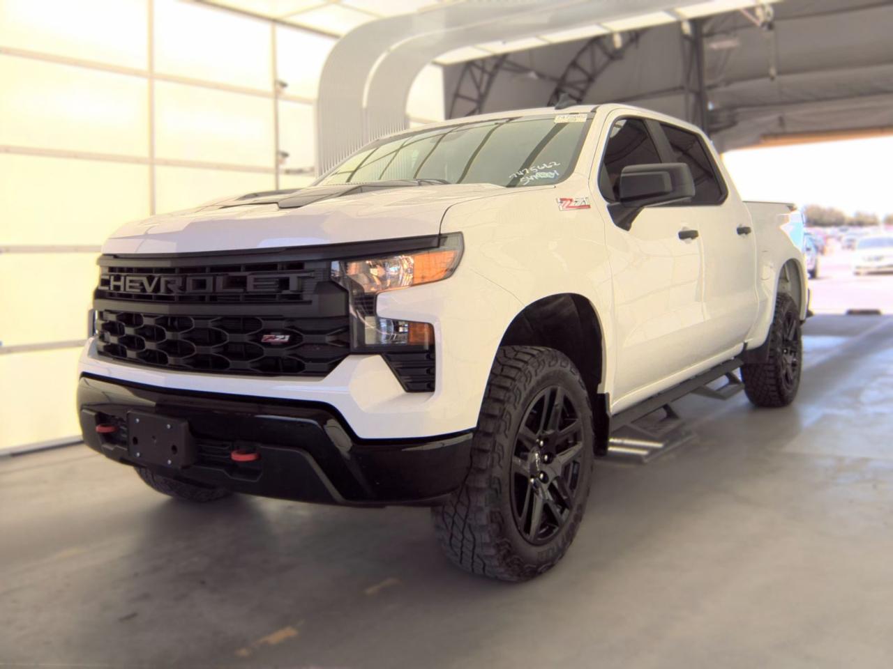 Chevrolet Silverado 1500 4WD Crew Cab 147" Custom Trail Boss 2024