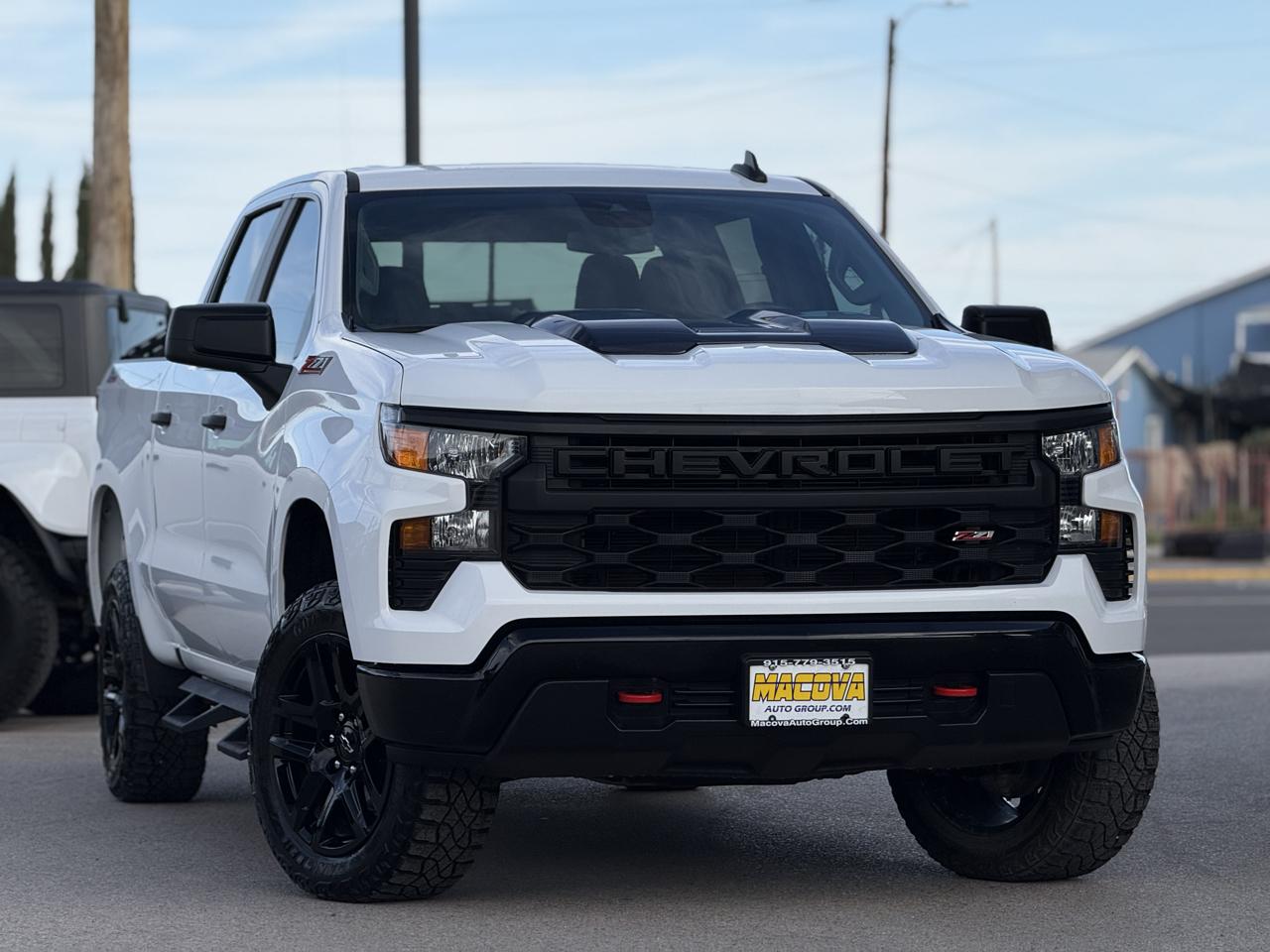 Chevrolet Silverado 1500 4WD Crew Cab 147" Custom Trail Boss 2024