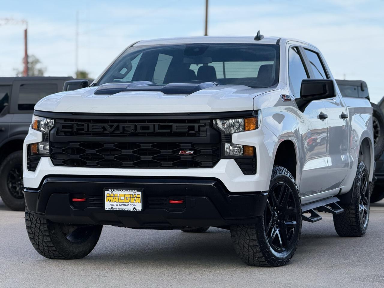 Chevrolet Silverado 1500 4WD Crew Cab 147" Custom Trail Boss 2024