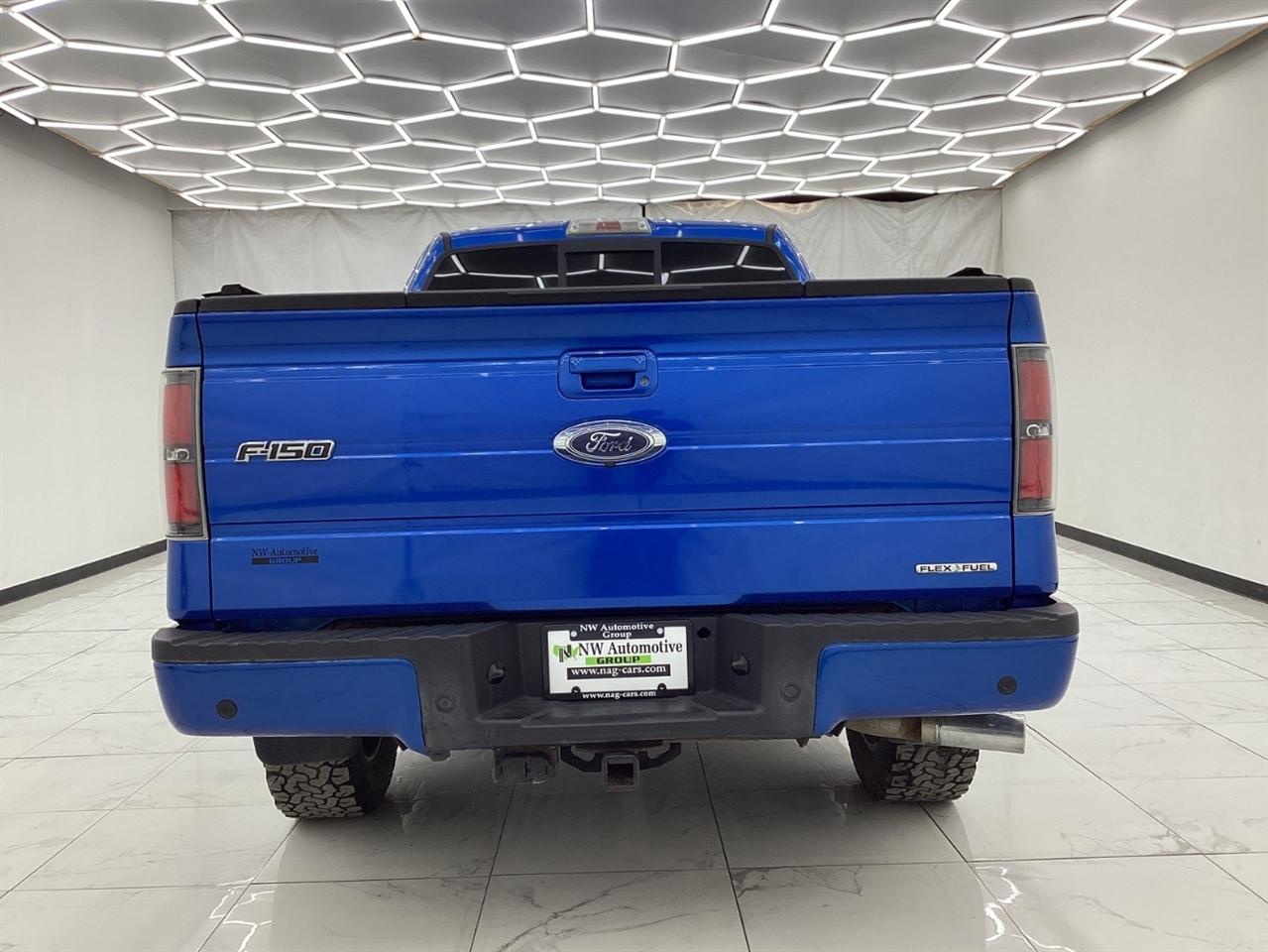 Ford 150 4WD SuperCab 145" Lariat 2011