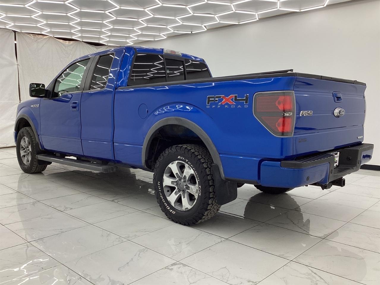Ford 150 4WD SuperCab 145" Lariat 2011