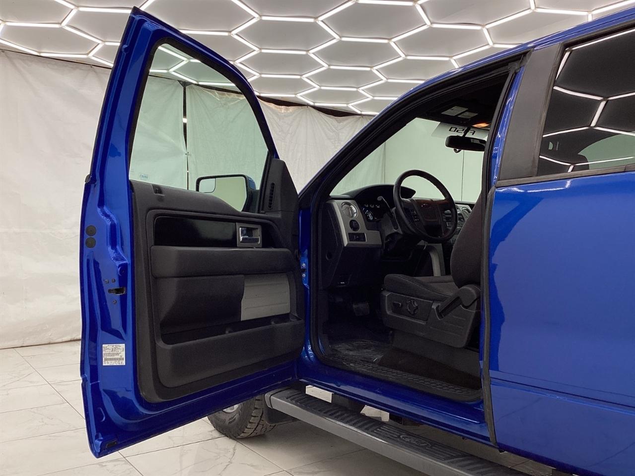 Ford 150 4WD SuperCab 145" Lariat 2011