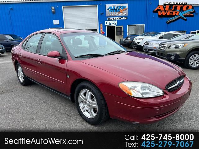 Red 2002 Ford Taurus SEL Deluxe Sedan Front-Wheel Drive Automatic