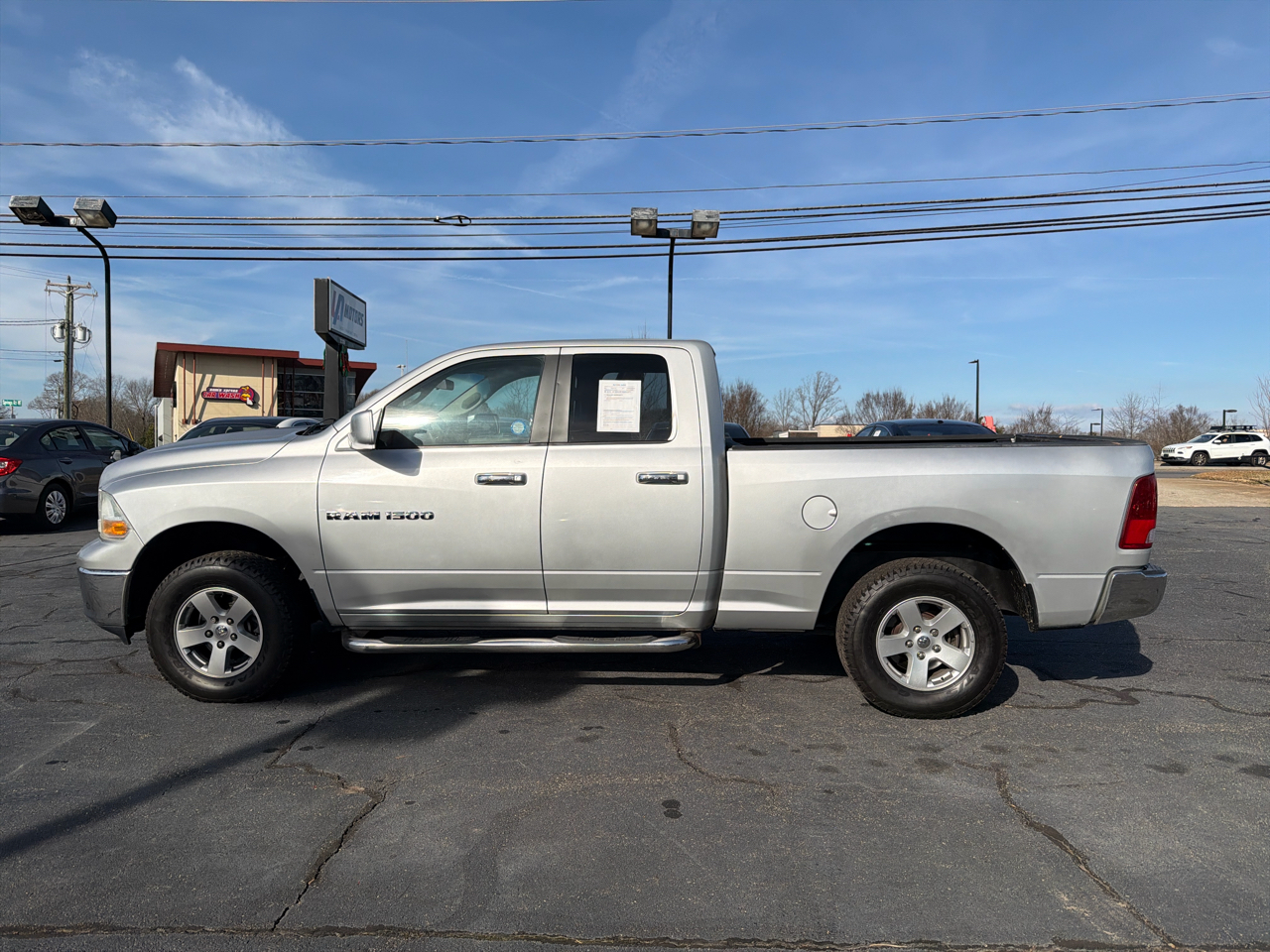 RAM 1500 4WD Quad Cab 140.5" SLT 2012