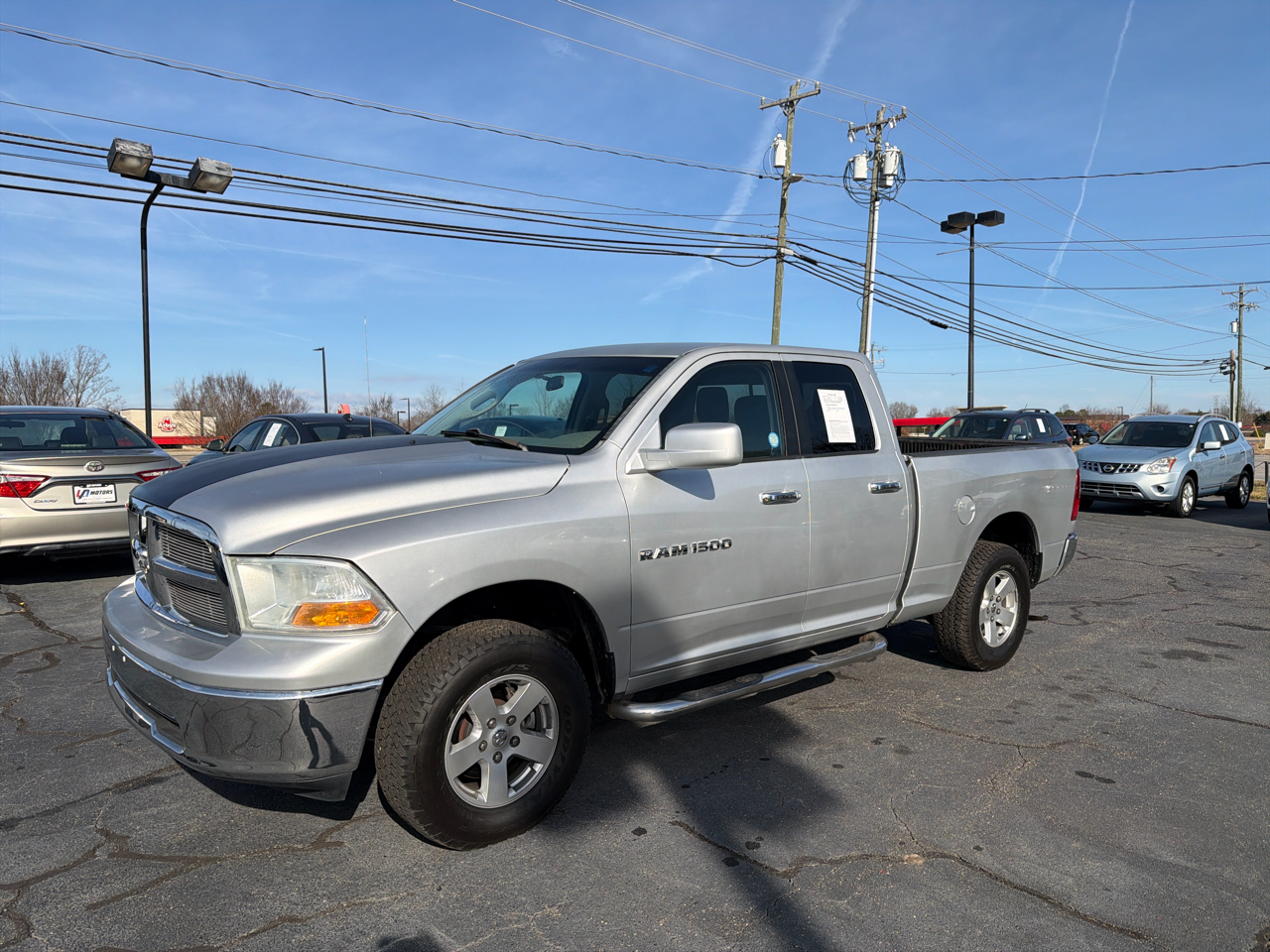 RAM 1500 4WD Quad Cab 140.5" SLT 2012