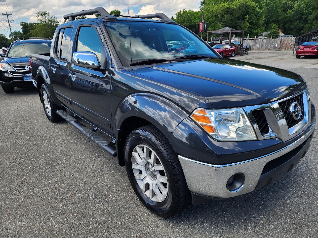 Nissan Frontier LE Crew Cab 4WD 2010