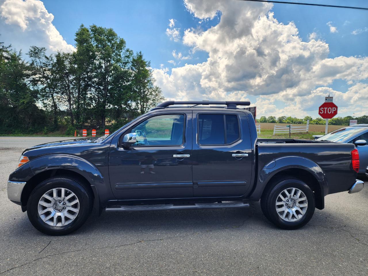 Nissan Frontier LE Crew Cab 4WD 2010