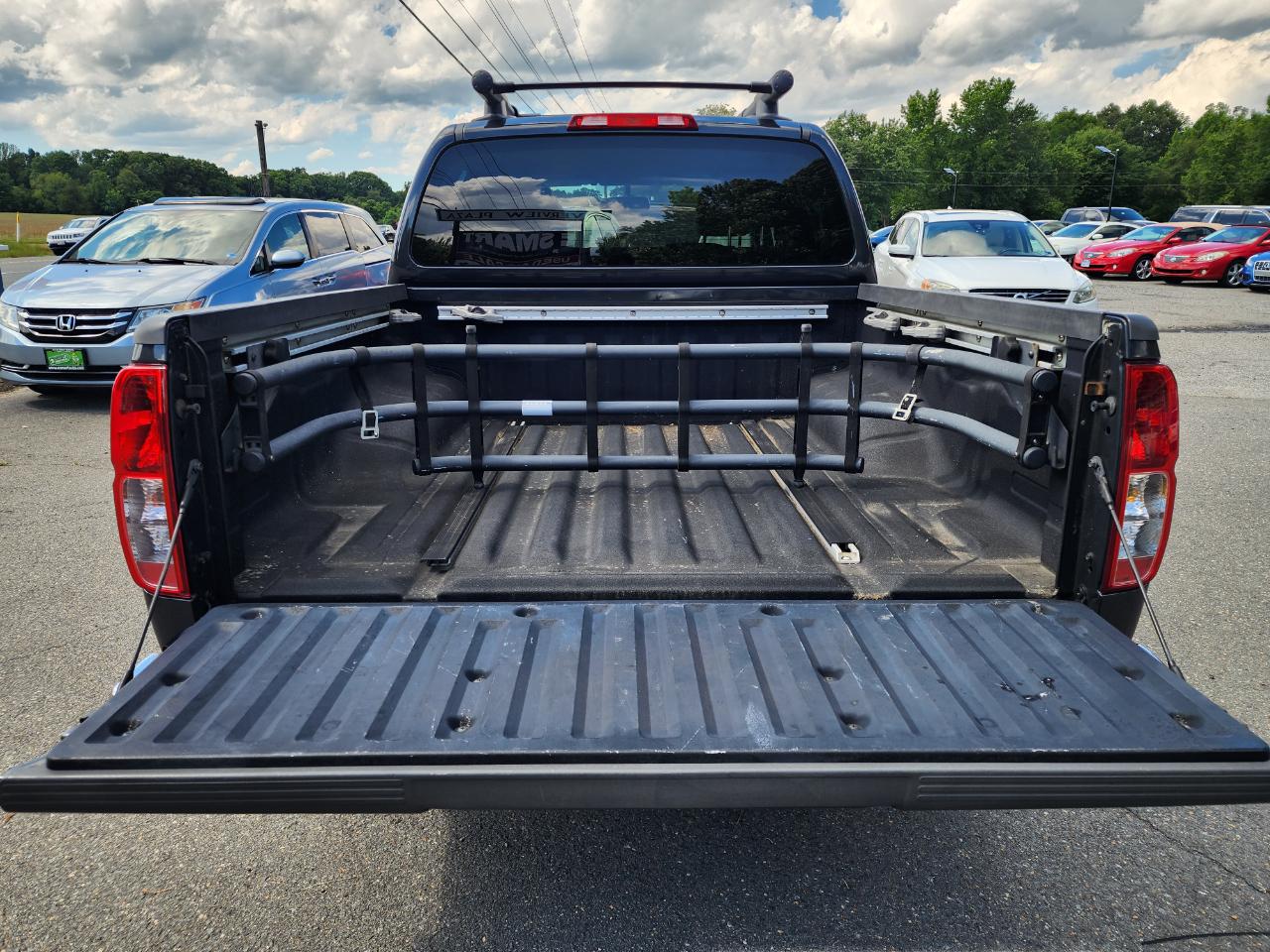 Nissan Frontier LE Crew Cab 4WD 2010
