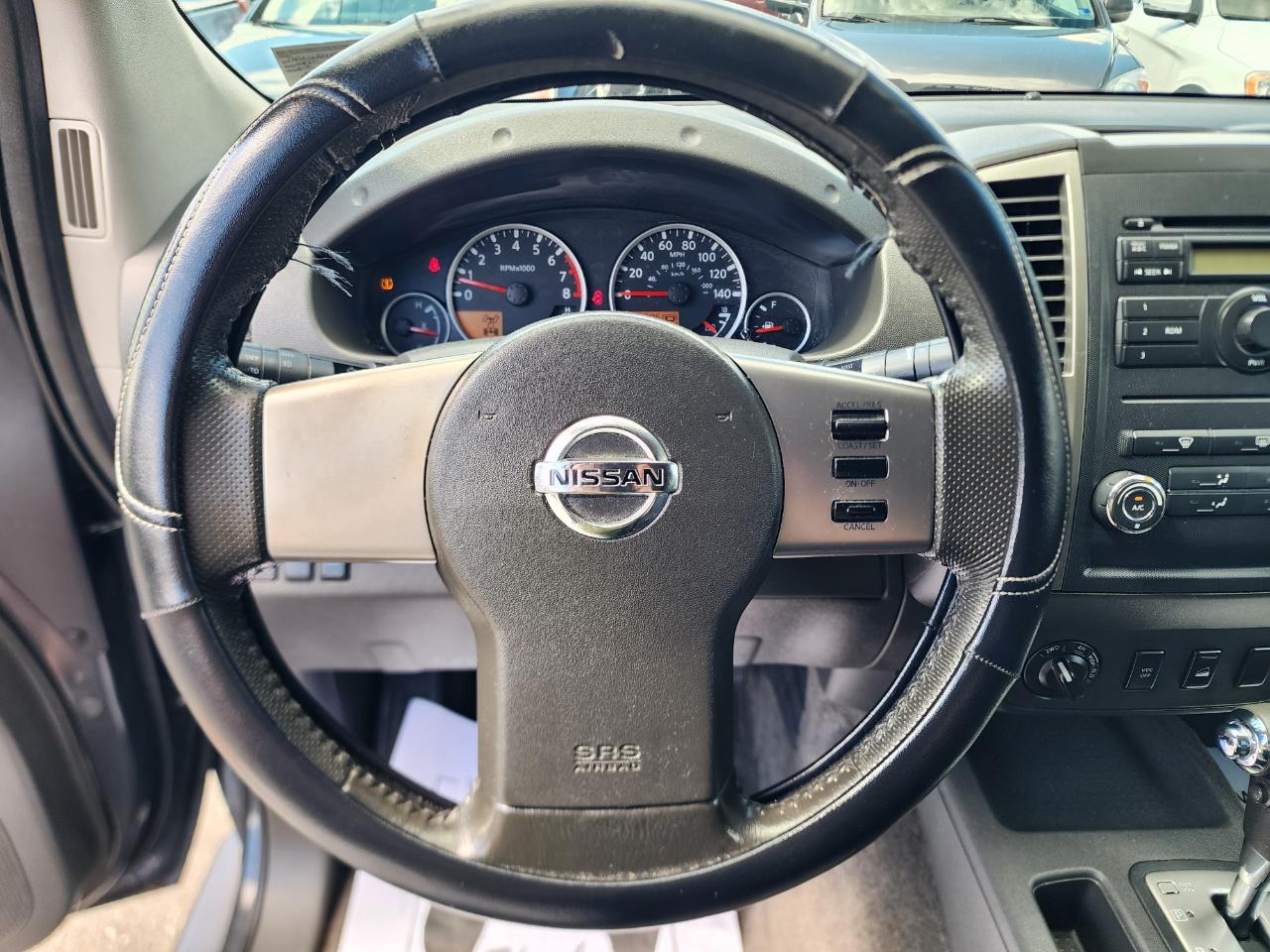 Nissan Frontier LE Crew Cab 4WD 2010