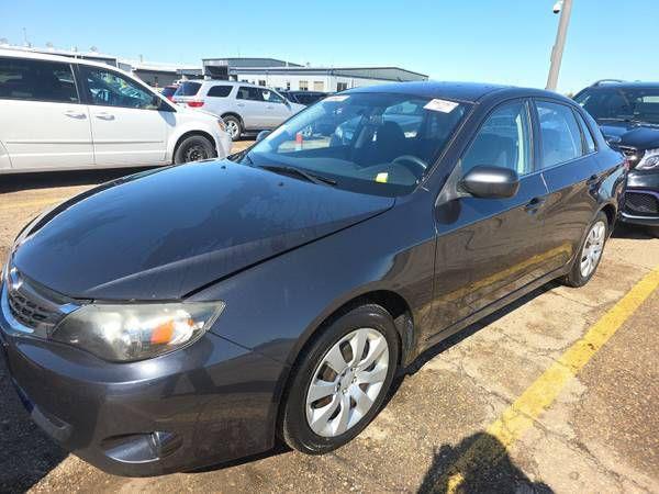 2009 Subaru Impreza 2.5i, 4 dr sedan, AWD, 4cyl, rare 5 speed manual !