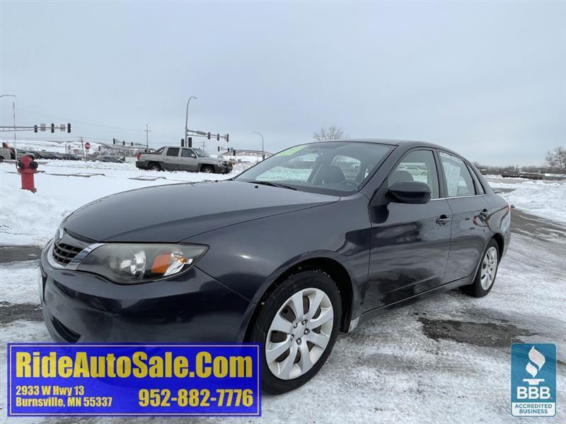 2009 Subaru Impreza 2.5i, 4 dr sedan, AWD, 4cyl, rare 5 speed manual !