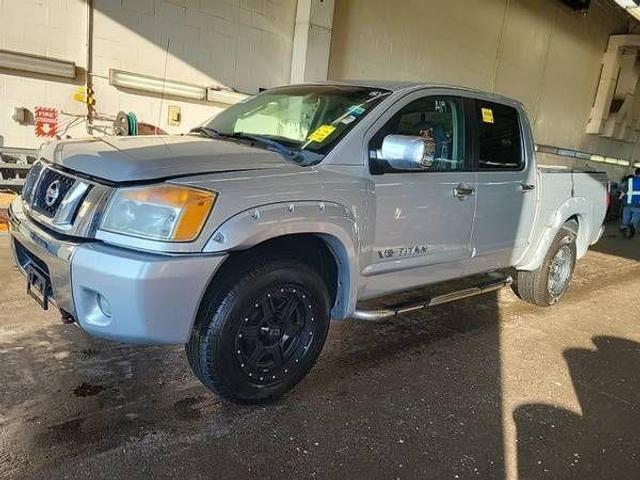 Silver 2011 Nissan Titan Pickup Truck Four-Wheel Drive Automatic