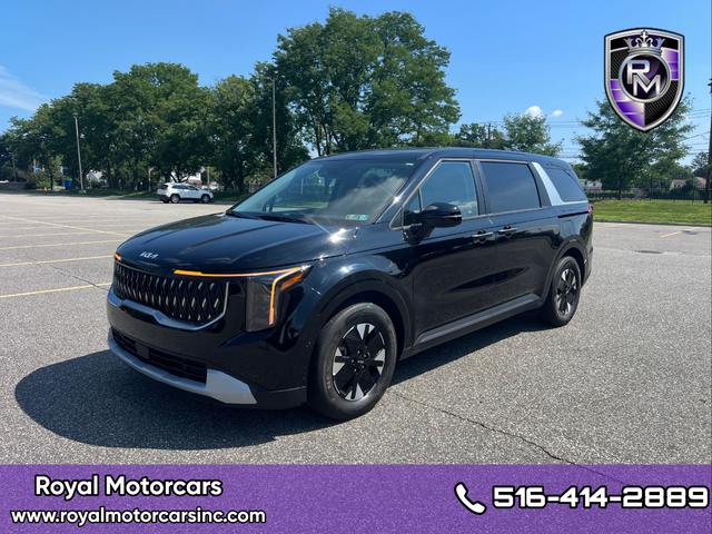 Black 2026 Kia Carnival Hybrid Minivan Front-Wheel Drive Automatic