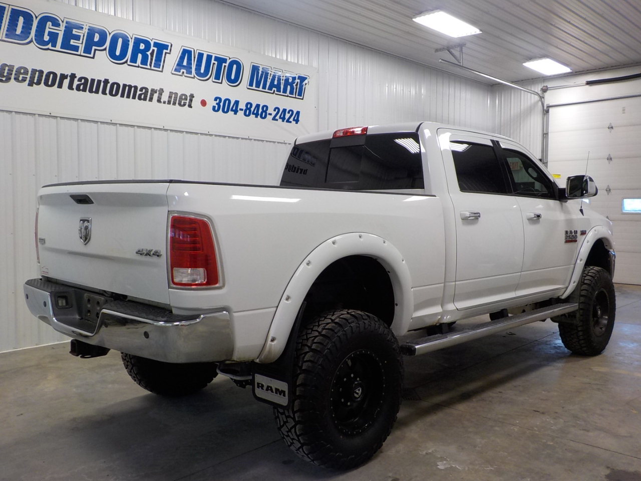 RAM 2500 4WD Crew Cab 149" Laramie 2014