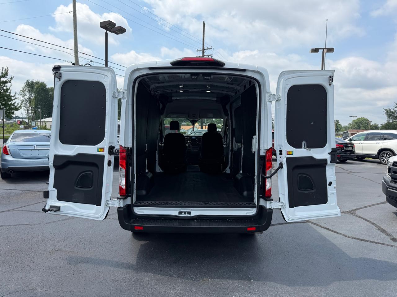 Ford Transit Cargo Van T-150 130" Med Rf 8670 GVWR RWD 2023
