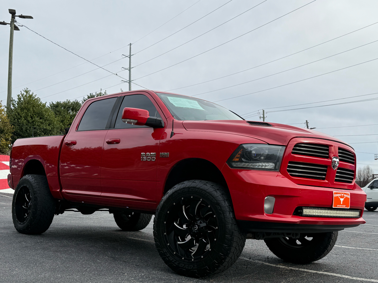RAM 1500 4WD Crew Cab 140.5" Sport 2015