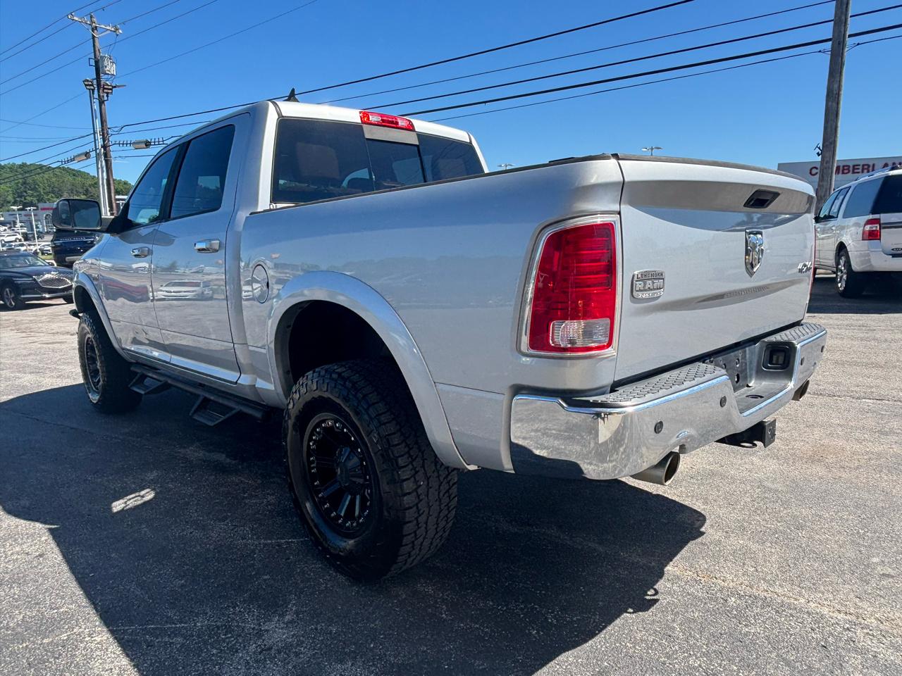 RAM 1500 4WD Crew Cab 140.5" Laramie Longhorn Edition 2013