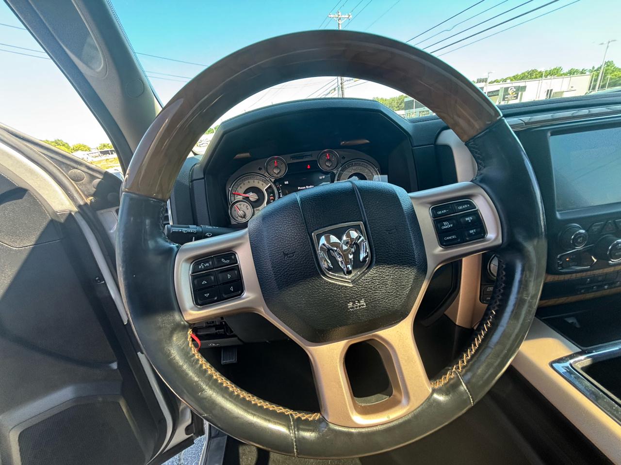 RAM 1500 4WD Crew Cab 140.5" Laramie Longhorn Edition 2013