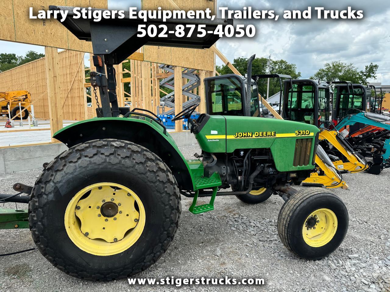 John Deere 1023E  1999