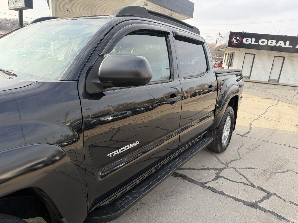 Toyota Tacoma 4WD Double Cab V6 MT (Natl) 2013