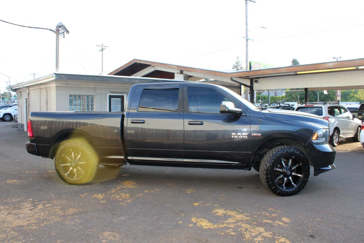 RAM 1500 4WD Crew Cab 149" Sport 2014