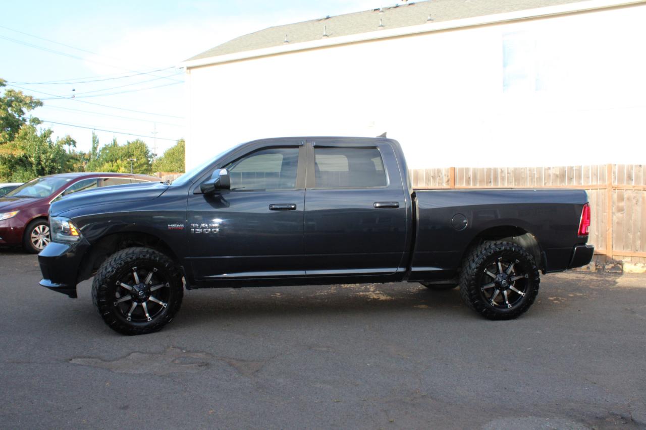 RAM 1500 4WD Crew Cab 149" Sport 2014
