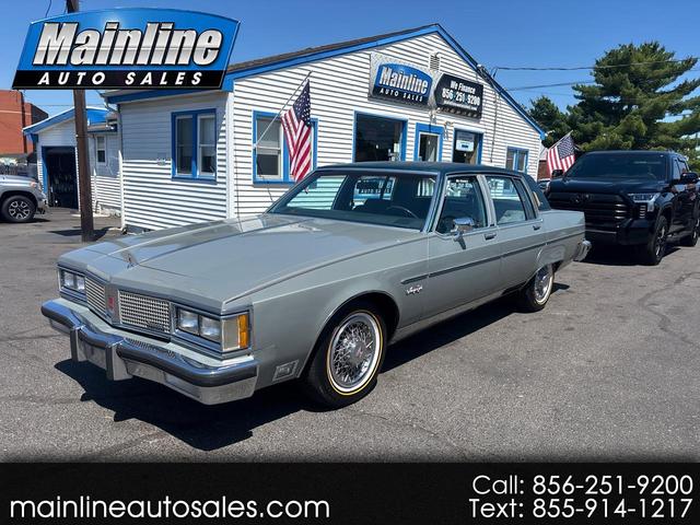 Gray 1983 Oldsmobile Ninety-Eight Regency Sedan RWD Sedan Rear-Wheel Drive Automatic