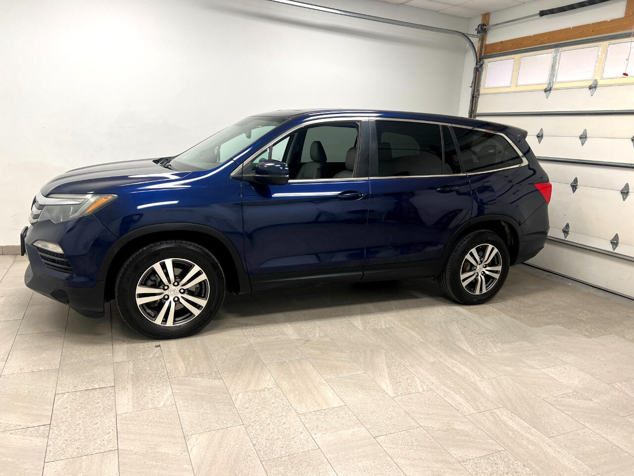 Used 2016 Honda Pilot EX-L with VIN 5FNYF6H53GB039939 for sale in Kansas City