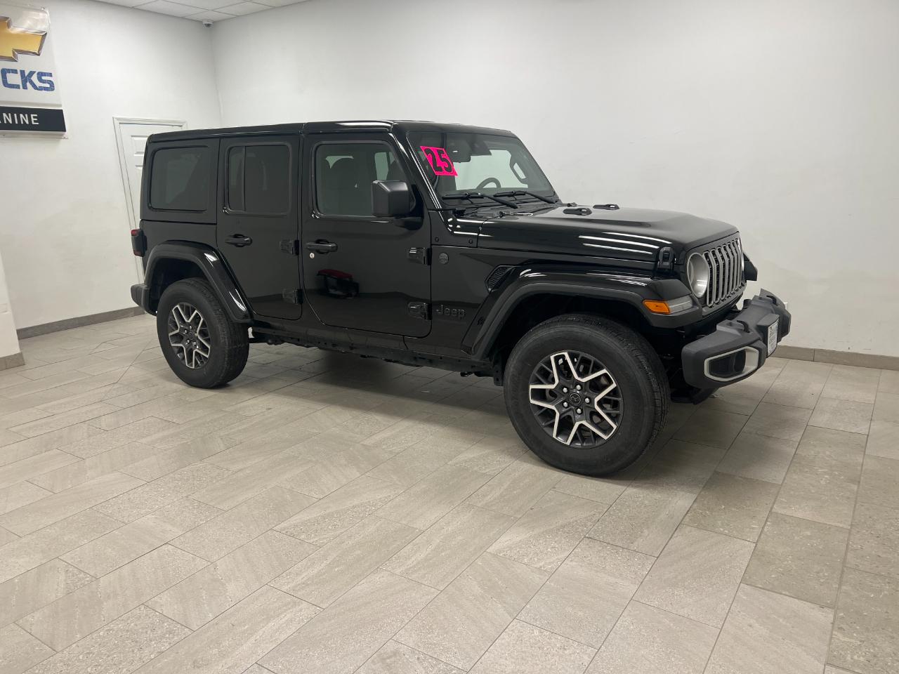 Used 2025 Jeep Wrangler 4-Door Sahara with VIN 1C4PJXEN3SW501117 for sale in Kansas City