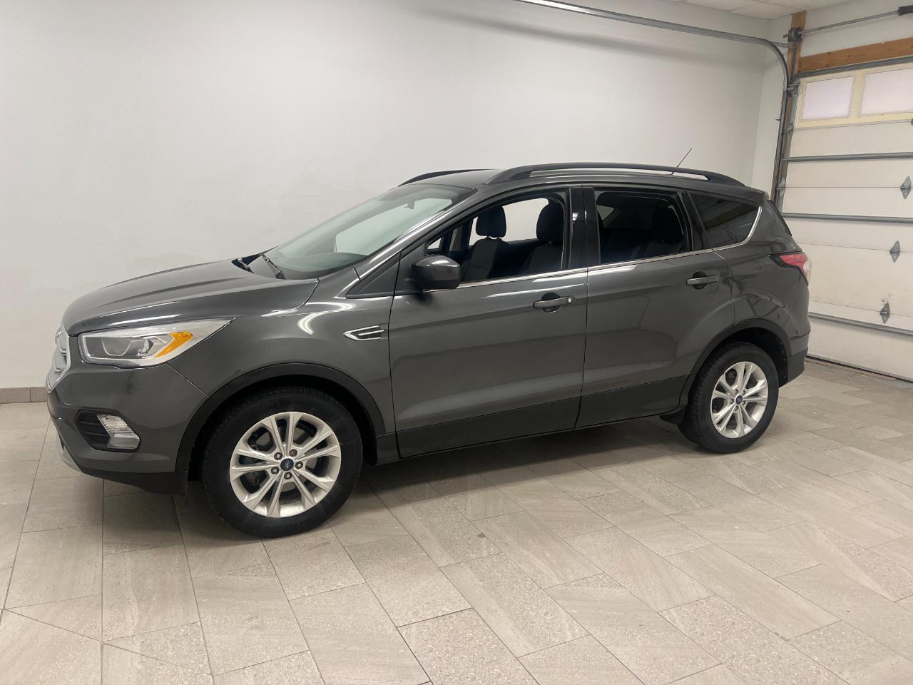 Used 2017 Ford Escape SE with VIN 1FMCU0GD2HUC63357 for sale in Kansas City