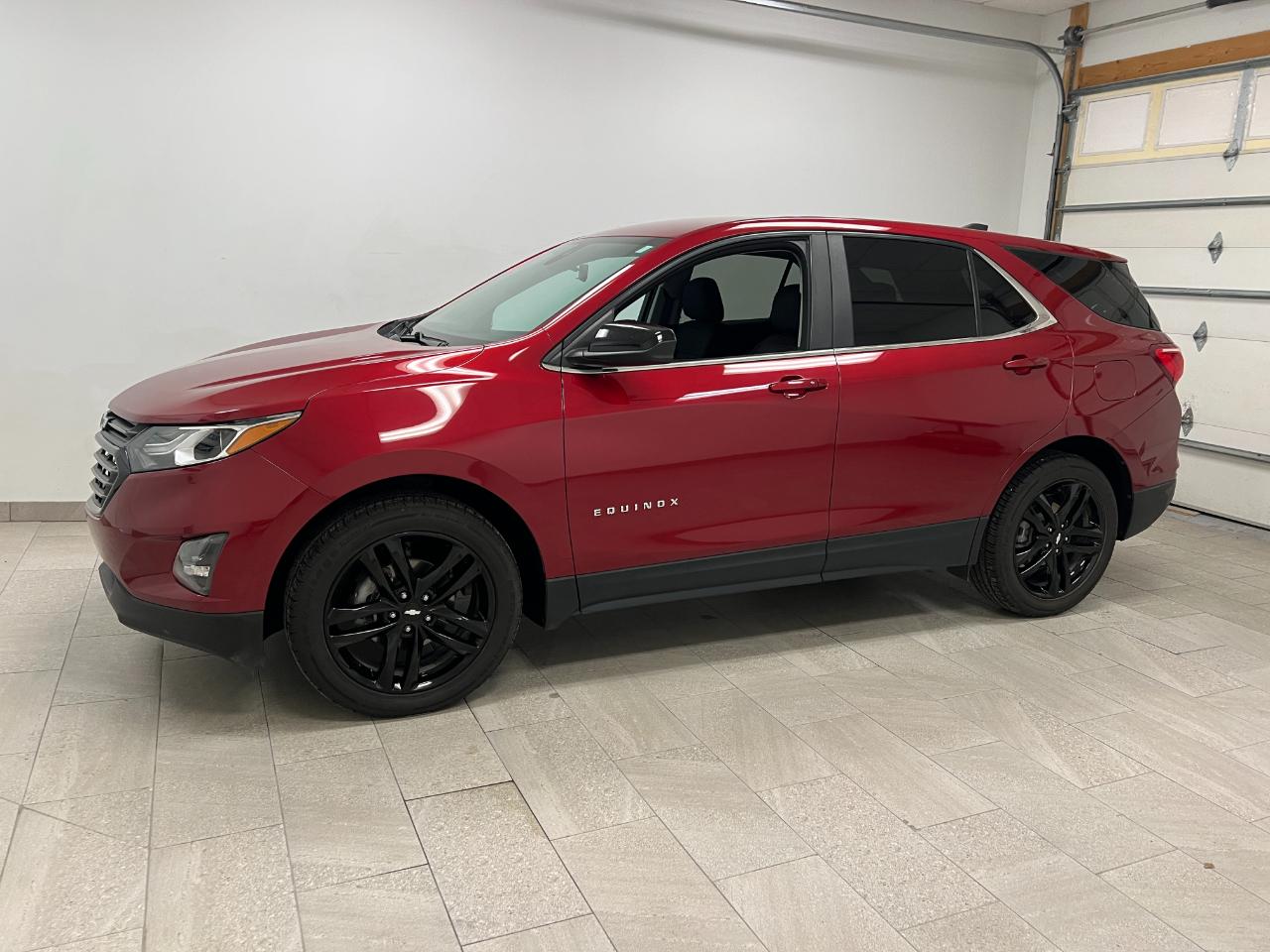 Used 2021 Chevrolet Equinox LT with VIN 2GNAXKEV6M6165927 for sale in Kansas City