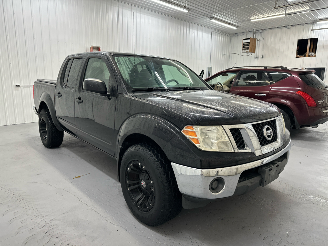 Nissan Frontier 4WD Crew Cab SWB Auto SE 2010 Nissan Frontier 4WD Crew Cab SWB Auto SE 2010