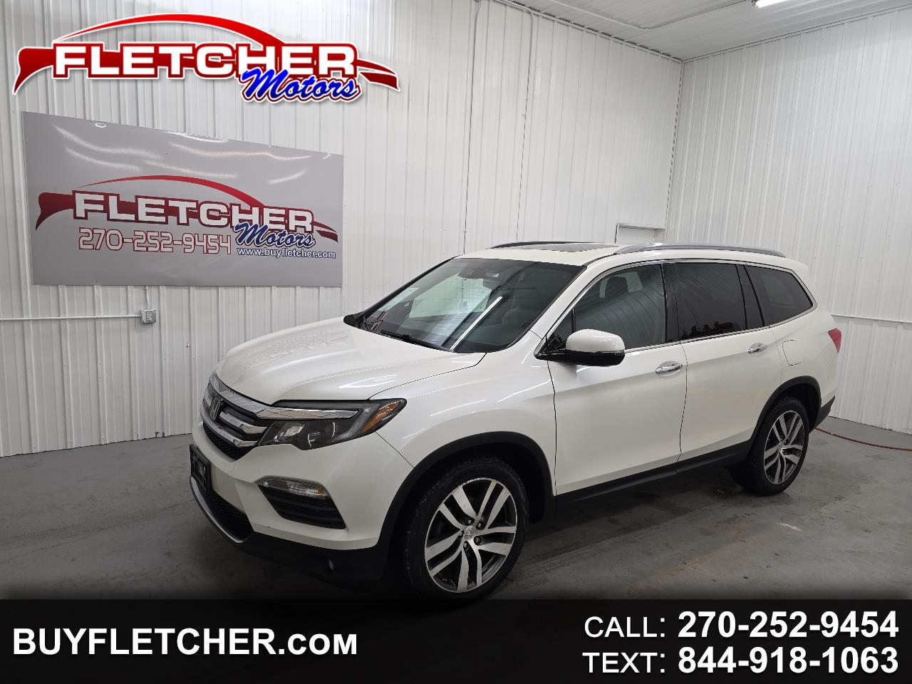 2016 Honda Pilot AWD 4dr Touring w/RES & Navi