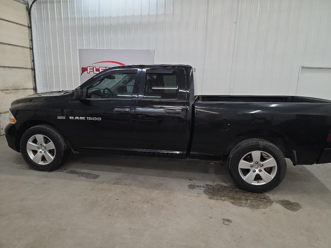 RAM 1500 2WD Quad Cab 140.5" Express 2012